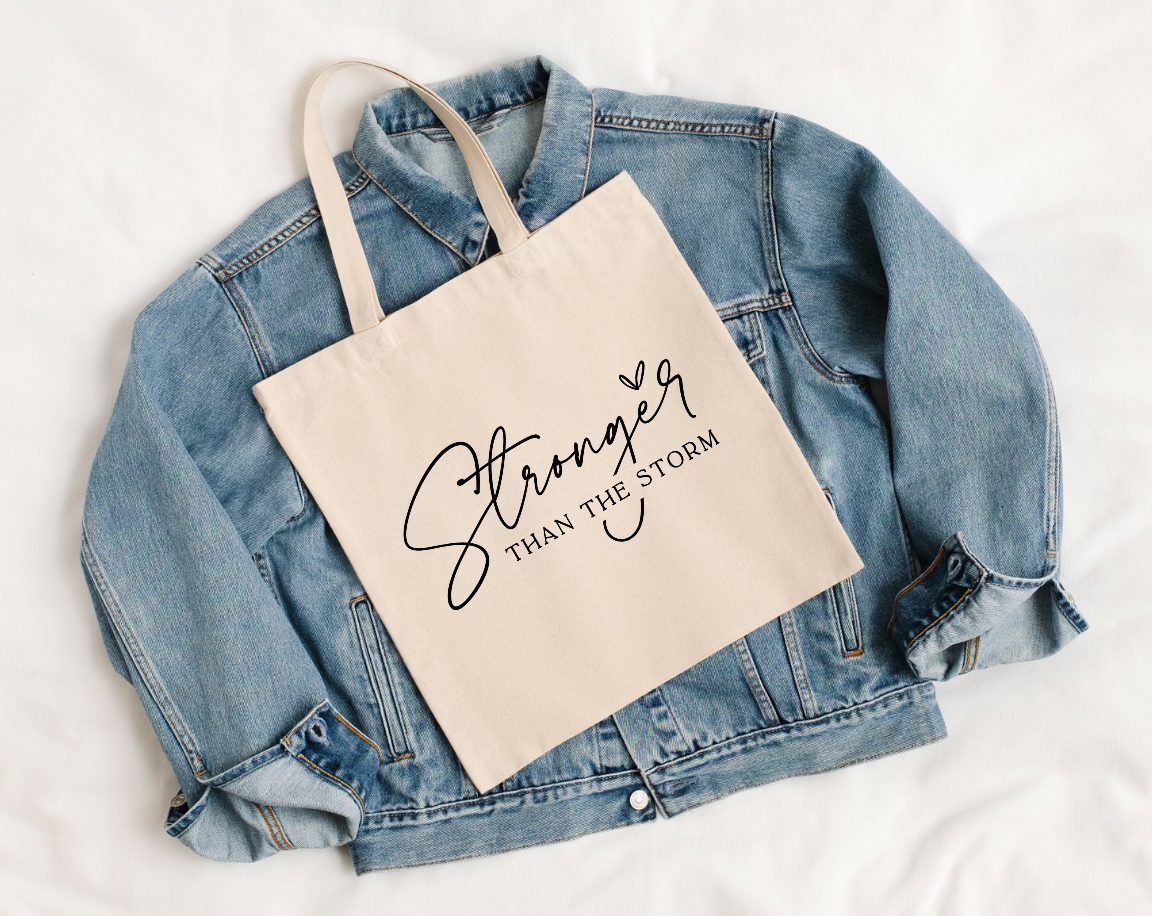 Stronger than the Storm Tote Bag